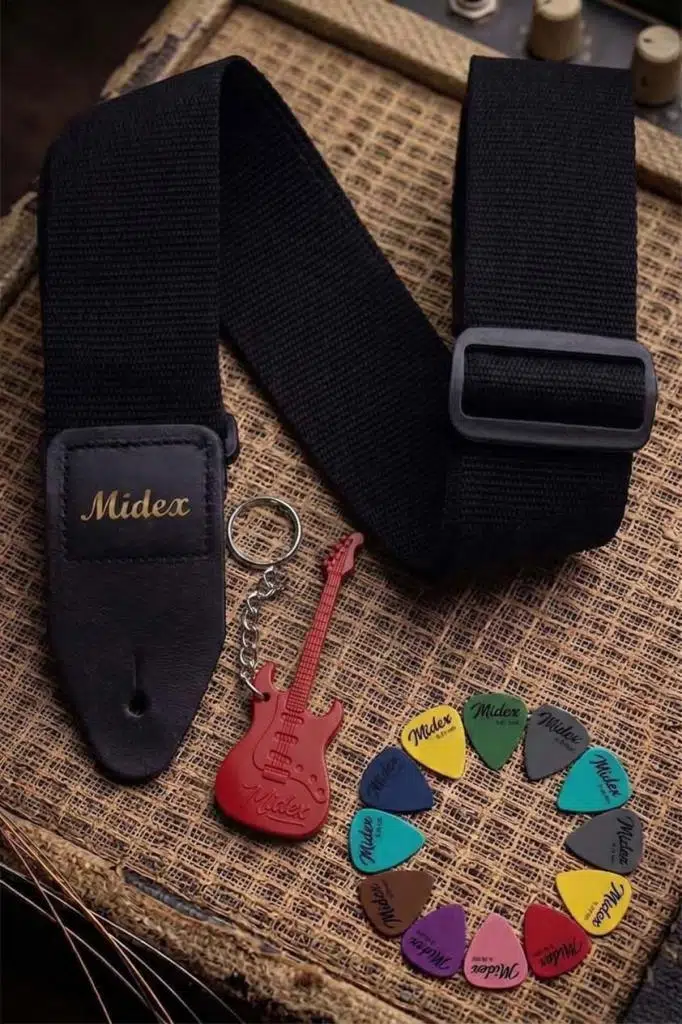 https://www.yonkamuzikmarket.com/midex-asm-26bk-gitar-omuz-askisi-siyah-renk-89-155cm-pena-hediye