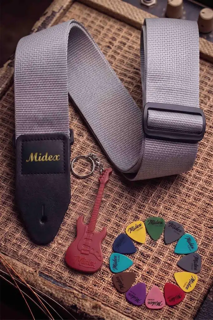 https://www.yonkamuzikmarket.com/midex-asm-26gry-gitar-omuz-askisi-gri-renk-89-155cm-pena-hediye