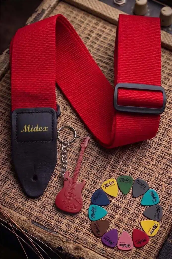 https://www.yonkamuzikmarket.com/midex-asm-26rd-gitar-omuz-askisi-kirmizi-renk-89-155cm-pena-hediye